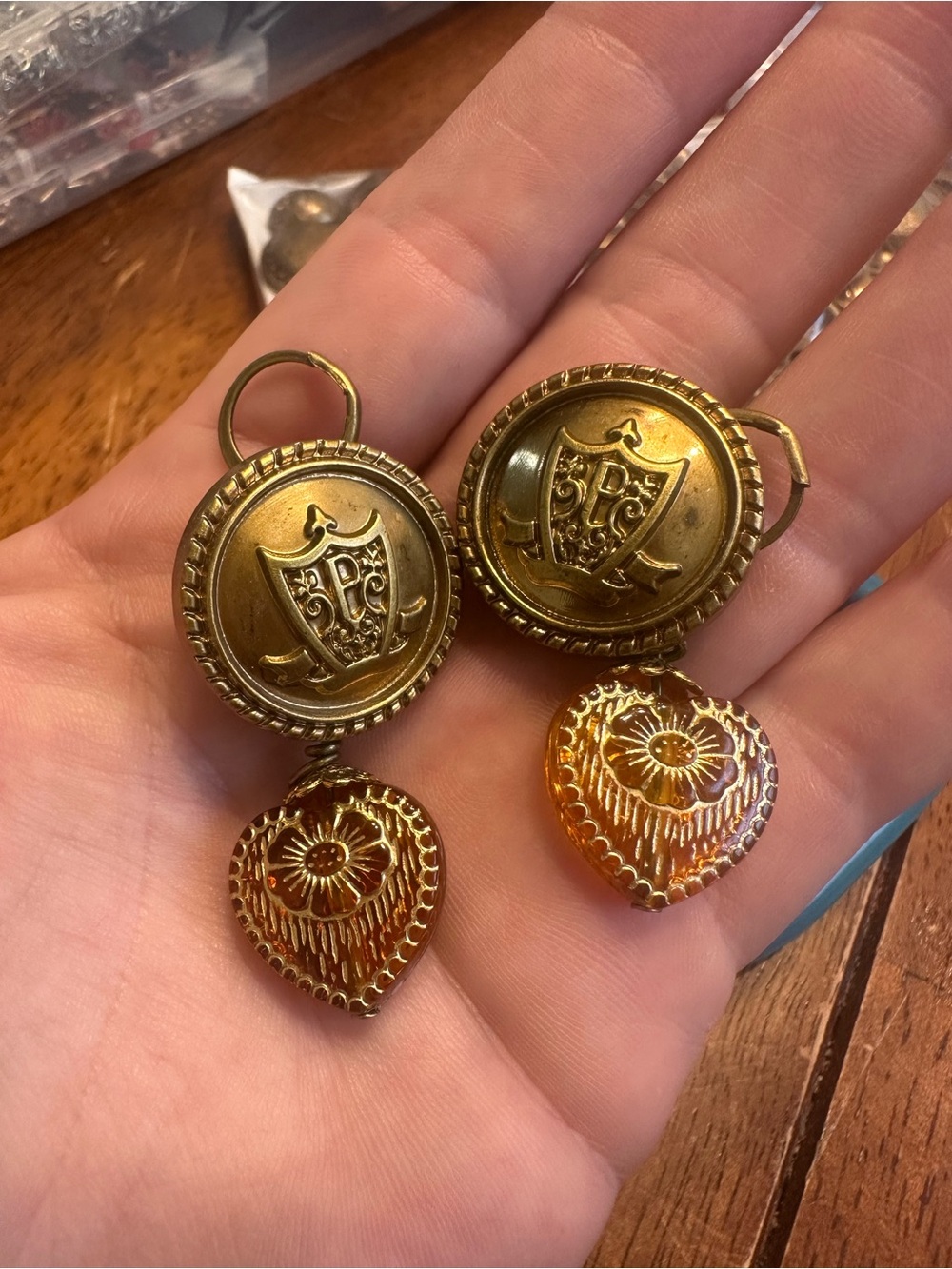 Gold-Tone Shield Drop Earrings with Amber Heart Dangles